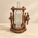 Front view of the nautical wooden bottle holder with turned supports and ship-wheel detail.